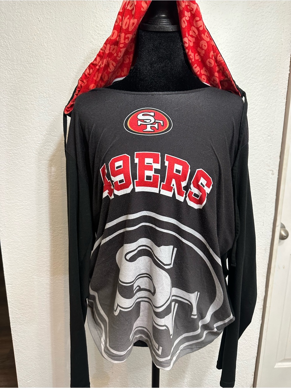 NFL San Francisco 49ers Black and Red Long-Sleeve Hooded Tee